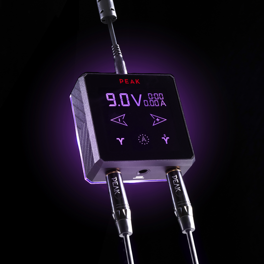 Glowing Peak Surge power supply with purple LED backlighting displaying a 9.0V output.