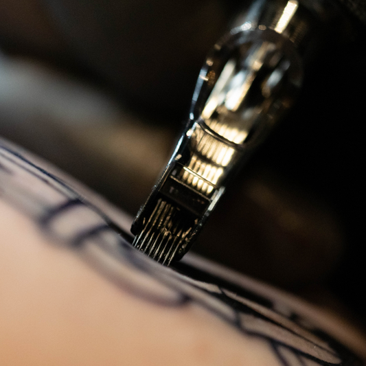 Macro shot of a magnum tattoo needle cartridge.