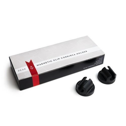 Box of Magnetic Clip Cord/RCA Holders with two holders out of box on white background, thumbnail size