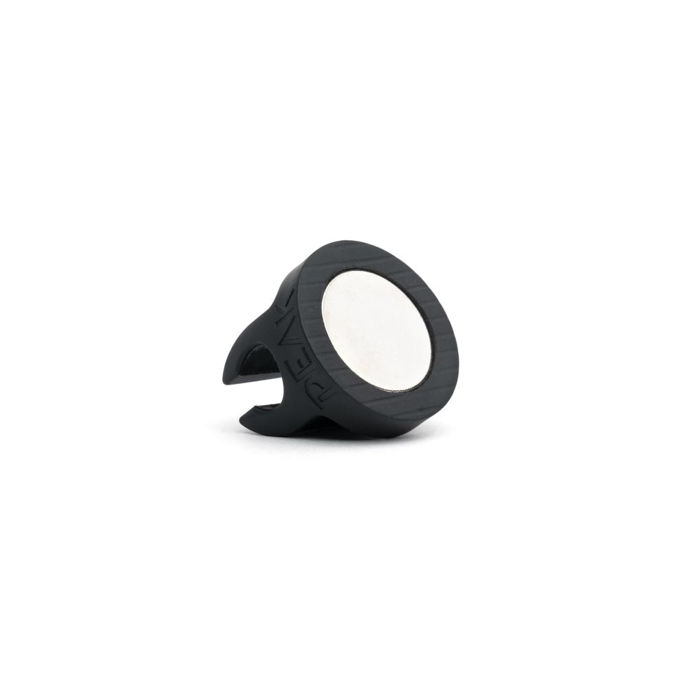 Bottom magnet on underside of Magnetic Clip Cord/RCA Holder on white background